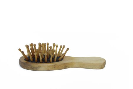 Wooden comb isolated on white backgroundの写真素材