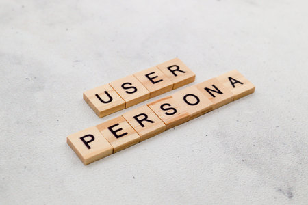 Top view of User Persona word on wooden cube letter block on white background. User interface and...