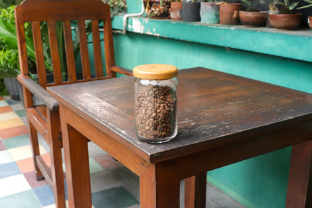 Coffee beans stored in glassware jarの写真素材