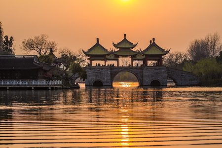 The sunset of Slender West Lake Bridgeの写真素材