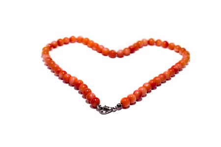coral beads isolated on whiteの写真素材