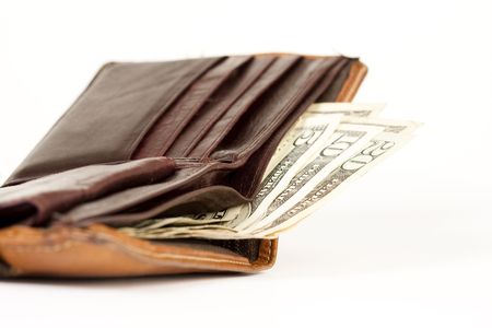 purse with dollar billsの写真素材