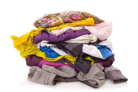 Heap of clothes on white background