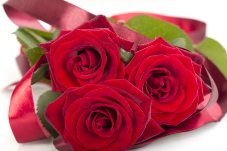 Decorated red roses isolated on white backgroundの写真素材