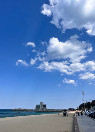 Beach and blue sky with white clouds in San Sebastian, Spainの写真素材