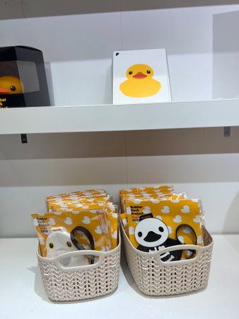 Basket with paper penguins in the shopping mall.の写真素材