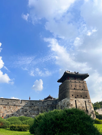Ancient Chinese city wall with blue sky and white clouds in Beijing, Chinaの写真素材