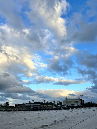 Clouds in the blue sky at the beach, closeup of photo