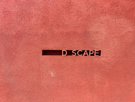 Red wall with the word DISCOP on the lettering.
