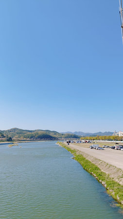 landscape view of the river and the mountains on a sunny day