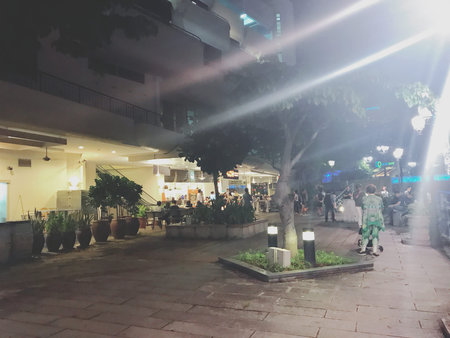 Unidentified people walking on the street in Hong Kong. Hong Kong is one of the most popular tourist...