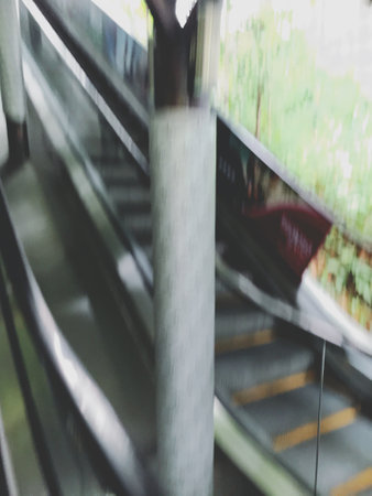 Blurred image of Escalator in the city for background usage.の写真素材