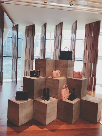 Luxury leather handbags and purses in a shopping mallの写真素材