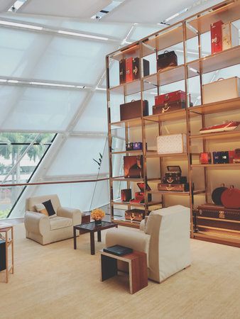 interior of modern living room with furniture, sofa and bookcase