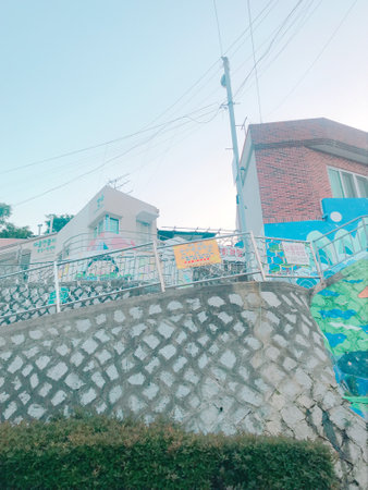 Street scene with colorful graffiti on wall, Chiang Mai, Thailand.の写真素材