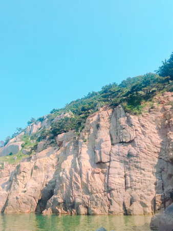 Rocky cliff and blue sky in the morning,Thailand.の写真素材