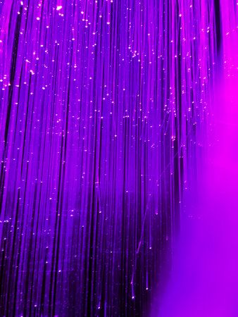 optical fibers dynamic flying from deep on technology light backgroundの写真素材