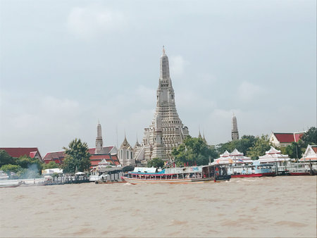 Wat Arun Temple on Chao Phraya River in Bangkok, Thailandの写真素材