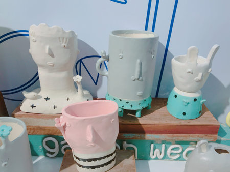 Ceramic pottery for sale in a shop, closeup of photoの写真素材
