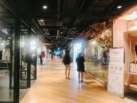 Unidentified people visit Siam Discovery department store in Bangkok, Thailand. Siam Discovery...