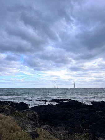 wind turbines on the seashore of the island of Lanzaroteの写真素材