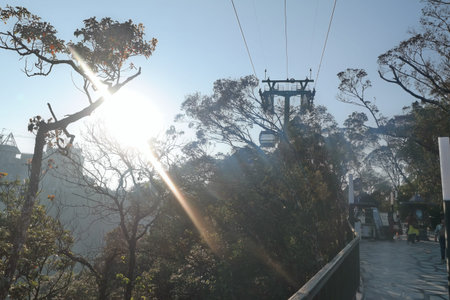 Cable car in Hong Kong at sunset. Hong Kong is a popular tourist destination.の写真素材