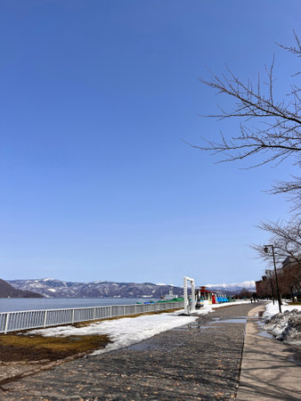 Parking lot in the park with blue sky in winter season.の写真素材