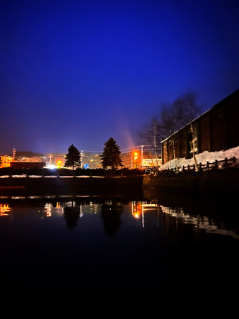 Night view of the river and the embankment of the cityの写真素材