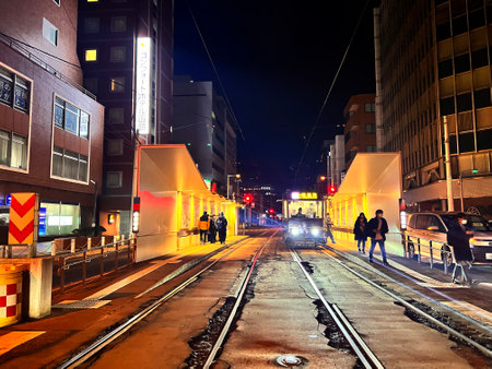 Tokyo tram tracks at night.の写真素材