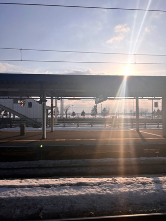 Sunset at the train station in winter, Hokkaido, Japan