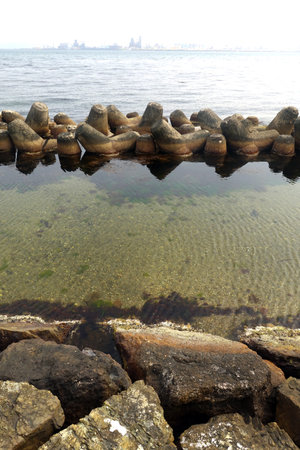 Stones in the water of the sea, closeup of photoの写真素材