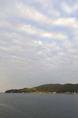 Coast of the sea in the evening, closeup of photoの写真素材