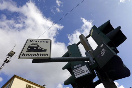 Pedestrian crossing sign on a traffic light in the city of Geneva, Switzerlandの写真素材
