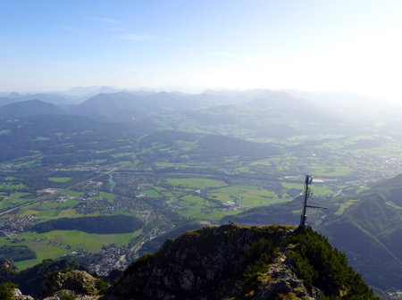 View from the top of a mountain with a view of the valleyの写真素材