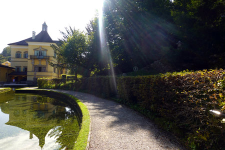 Sun rays in the garden of Villa Taranto, Tuscany, Italy