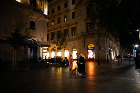 Tourists in the streets of Barcelona at nightの写真素材