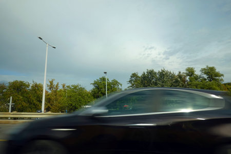 car on the road with motion blur background. drive on highway.