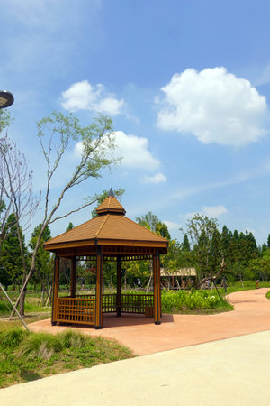 Gazebo in park with blue sky background, Thailand.の写真素材