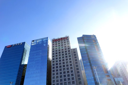 Buildings in the blue sky and sun, closeup of photo