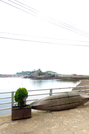 boat on the beach in chonburi province, thailand.の写真素材