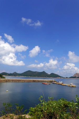 landscape of sea and blue sky in hong kong.の写真素材