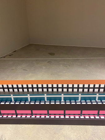 Colorful wooden stairs in an empty room, closeup of photo