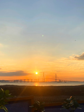 Sunset over San Francisco Bay Bridge, California, United States.の写真素材