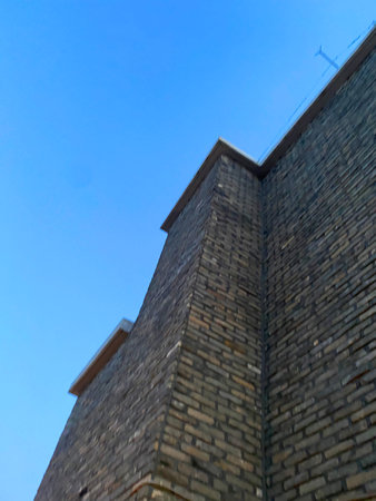 wall of stone and blue sky, closeup photo with selective focus