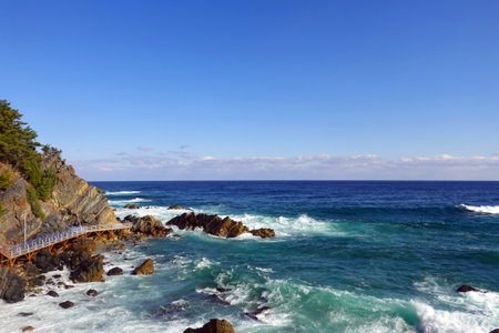 Beautiful view of the ocean and the cliffs on a sunny day.の写真素材