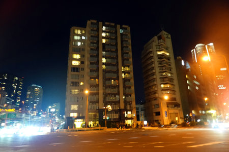 the light trails on the modern building background in shanghai chinaの写真素材