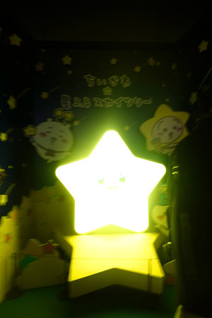 Christmas decoration in the form of a star in the dark room.
