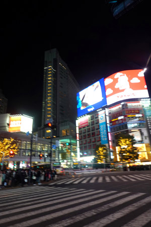 Shibuya Crossing at night. Shibuya Crossing is one of the busiest crosswalks in Tokyo.の写真素材