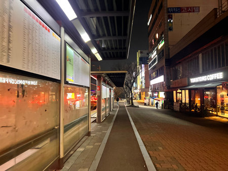 Shinjuku street at night. Shinjuku is one of Tokyo's major commercial districts.の写真素材