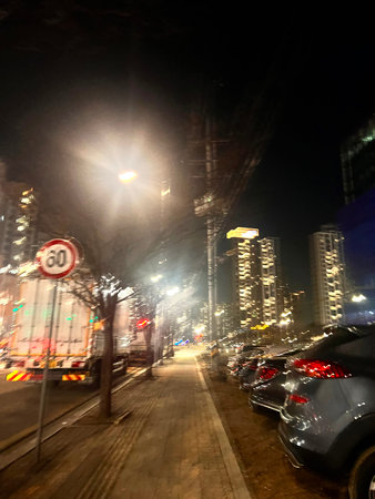 Cars on the street at night in Hong Kong, China.のeditorial素材